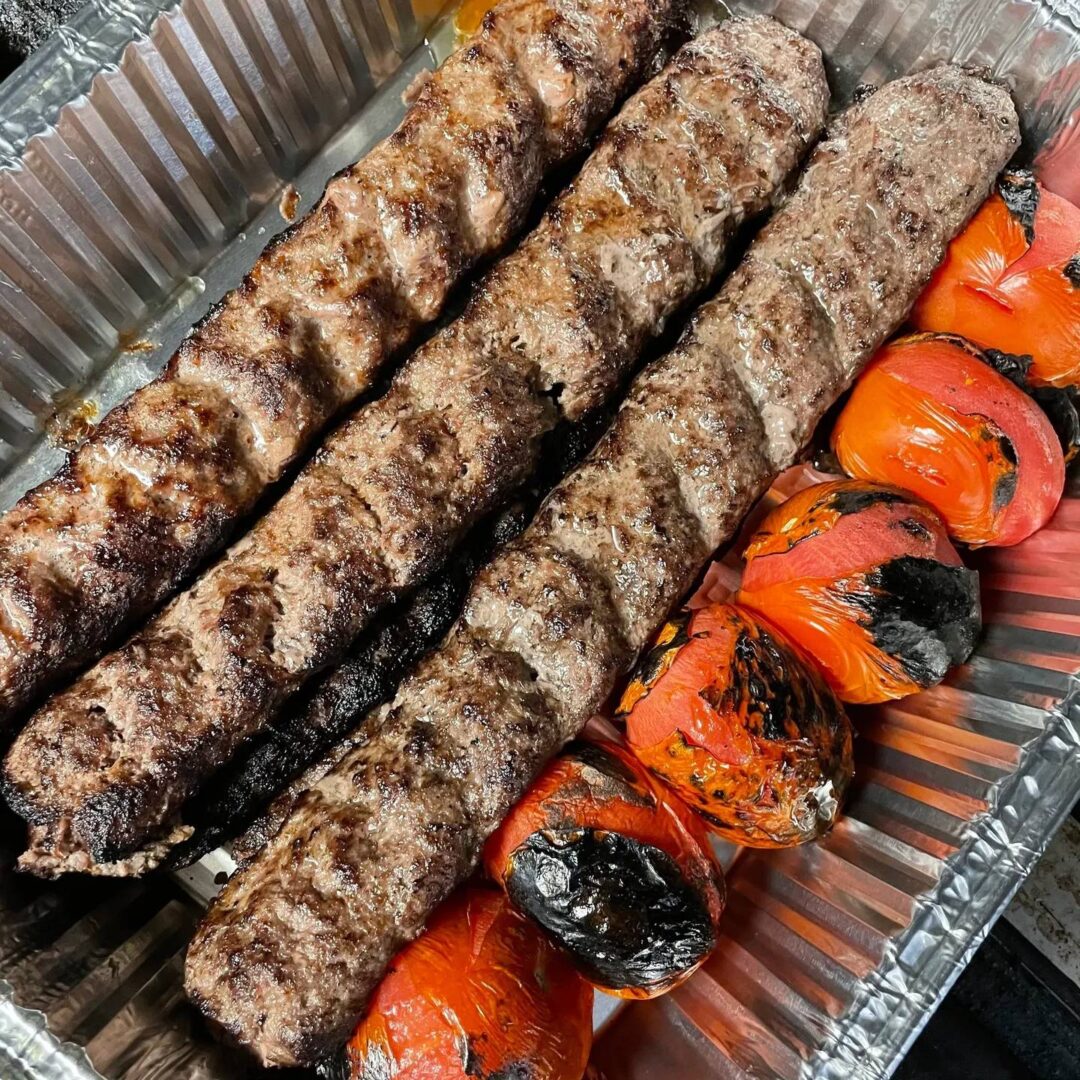 Grilled kebabs and tomatoes